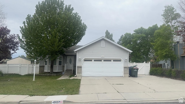 4005 S 4050 W, West Valley City, UT 84120 - ranch-style home featuring an attached garage and concrete driveway
