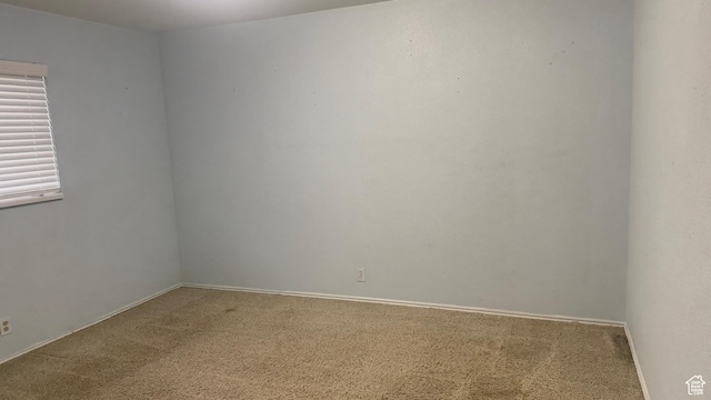4005 S 4050 W, West Valley City, UT 84120 - carpeted spare room featuring baseboards