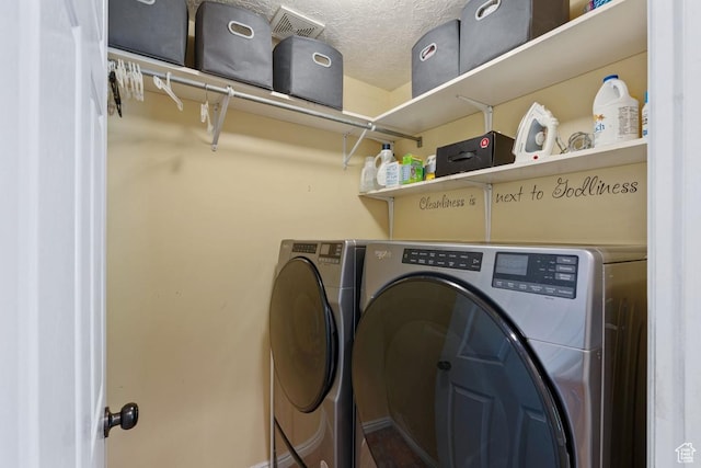 1516 N Willow Valley Dr W, Centerville, UT 84014 - washroom with washer and dryer and a textured ceiling
