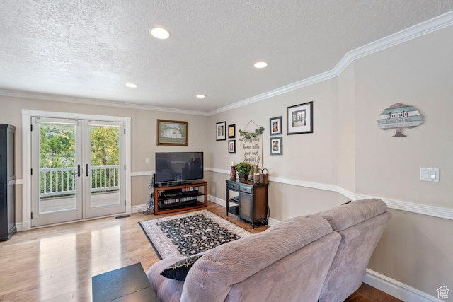 1516 N Willow Valley Dr W, Centerville, UT 84014 - living room with wood finished floors, french doors, crown molding, a textured ceiling, and recessed lighting