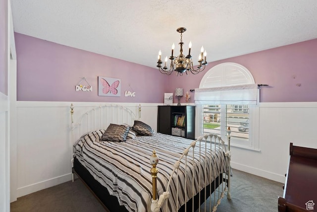 1516 N Willow Valley Dr W, Centerville, UT 84014 - bedroom with carpet floors, a chandelier, and baseboards