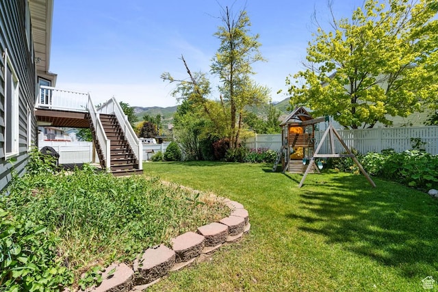 1516 N Willow Valley Dr W, Centerville, UT 84014 - view of yard with a playground, stairs, and a mountain view