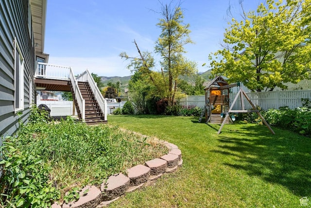 1516 N Willow Valley Dr W, Centerville, UT 84014 - view of yard featuring a playground, stairs, and a mountain view