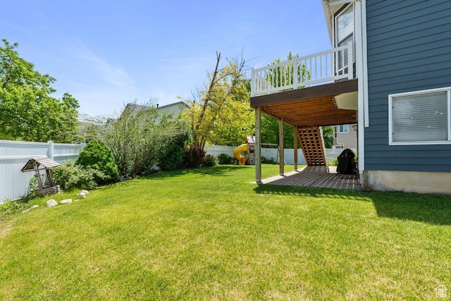 1516 N Willow Valley Dr W, Centerville, UT 84014 - view of yard with a wooden deck and a playground