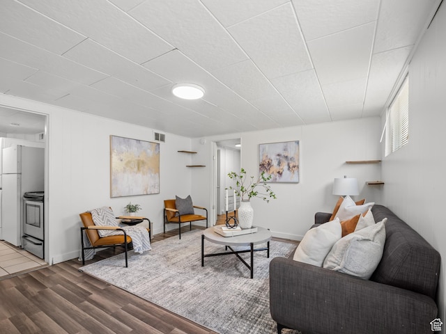 1067 S 400 E, Salt Lake City, UT 84111 - living area featuring wood finished floors and baseboards