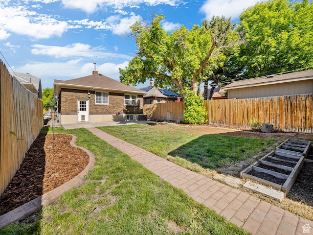 1067 S 400 E, Salt Lake City, UT 84111 - fenced backyard with a patio