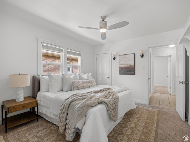 1067 S 400 E, Salt Lake City, UT 84111 - bedroom with light colored carpet and a ceiling fan