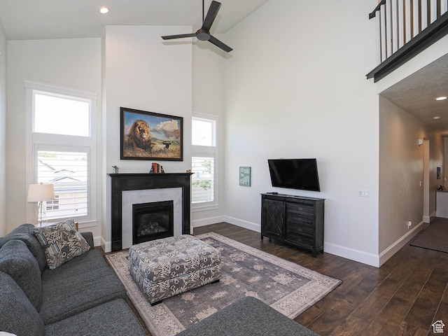 104 S Summer Breeze Ln W, Layton, UT 84041 - living area with a high ceiling, wood finished floors, baseboards, a ceiling fan, and recessed lighting