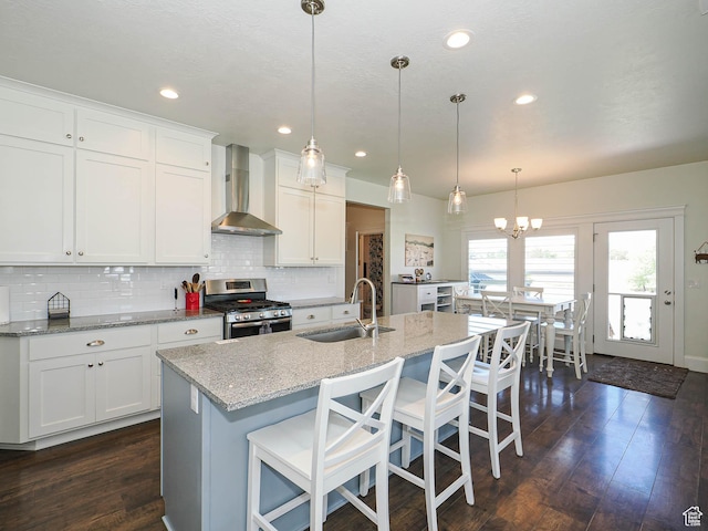 104 S Summer Breeze Ln W, Layton, UT 84041 - kitchen featuring wall chimney range hood, a sink, stainless steel range with gas cooktop, dark wood-style flooring, and recessed lighting