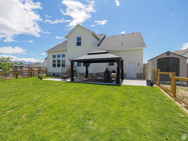 104 S Summer Breeze Ln W, Layton, UT 84041 - back of house with a gazebo, a patio, and roof with shingles