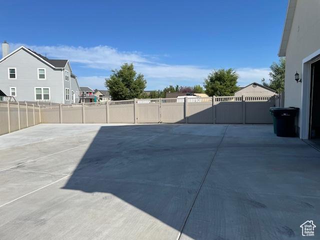 104 S Summer Breeze Ln W, Layton, UT 84041 - view of patio with a gate