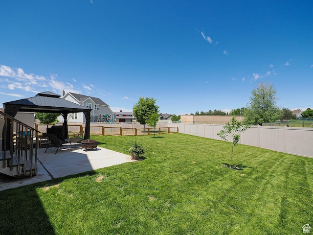 104 S Summer Breeze Ln W, Layton, UT 84041 - view of yard featuring a patio, an outdoor fire pit, and a gazebo