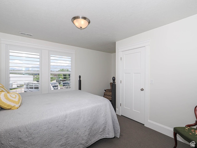 104 S Summer Breeze Ln W, Layton, UT 84041 - bedroom featuring dark colored carpet and baseboards