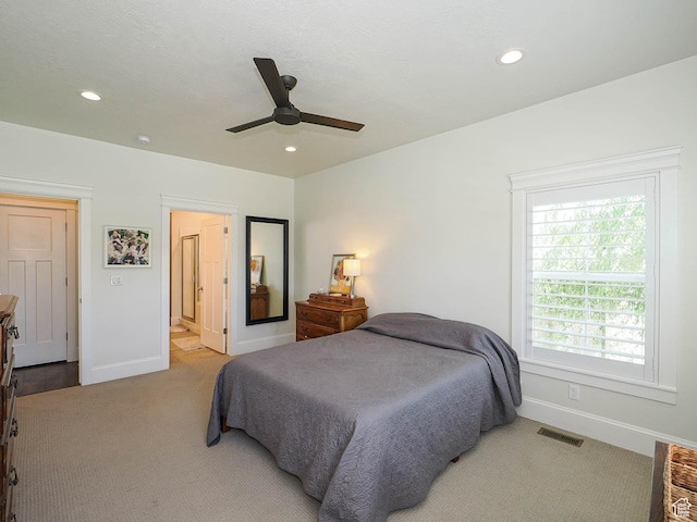 104 S Summer Breeze Ln W, Layton, UT 84041 - bedroom with light carpet, baseboards, recessed lighting, a ceiling fan, and ensuite bathroom
