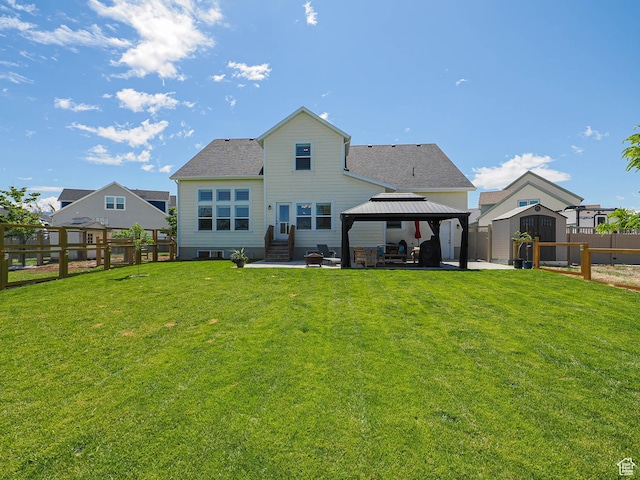 104 S Summer Breeze Ln W, Layton, UT 84041 - back of property featuring a gazebo, a patio, and a shingled roof