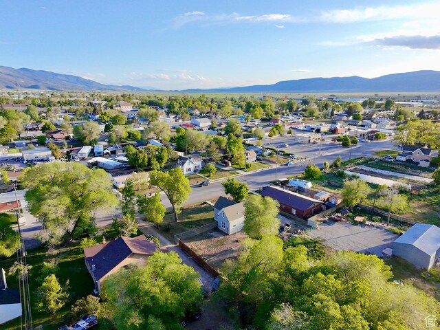 59 E 300 N, Ephraim, UT 84627 - aerial overview of property's location featuring a mountainous background and nearby suburban area