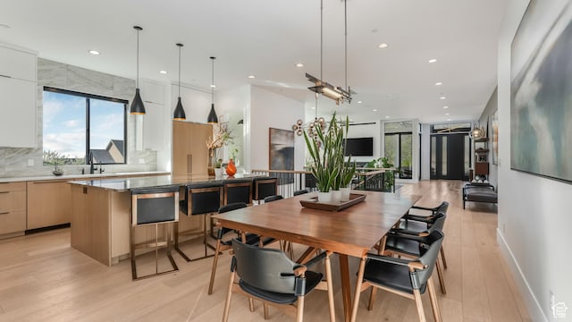 14708 S Woods Landing Ct E, Draper, UT 84020 - dining room featuring recessed lighting and light wood-type flooring