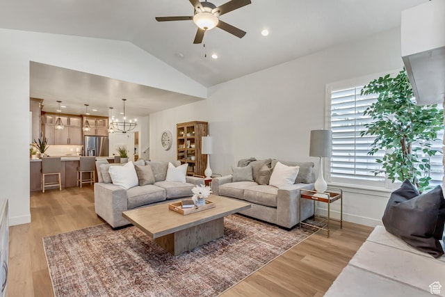 864 S 1260 W Unit 129, Heber City, UT 84032 - living room featuring a ceiling fan, light wood-style flooring, lofted ceiling, a chandelier, and baseboards