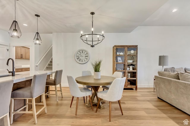 864 S 1260 W Unit 129, Heber City, UT 84032 - dining room featuring a chandelier, light wood-style flooring, stairs, baseboards, and recessed lighting