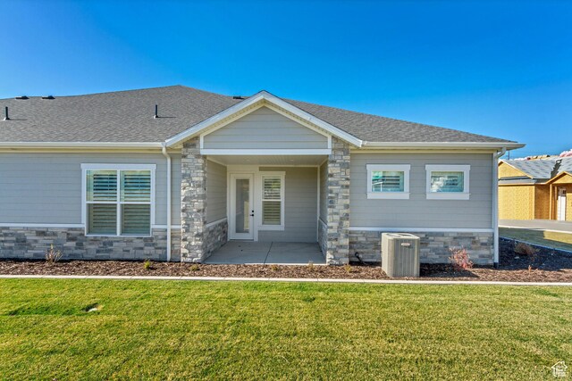 864 S 1260 W Unit 129, Heber City, UT 84032 - craftsman-style home featuring central AC unit, stone siding, a front lawn, and a shingled roof