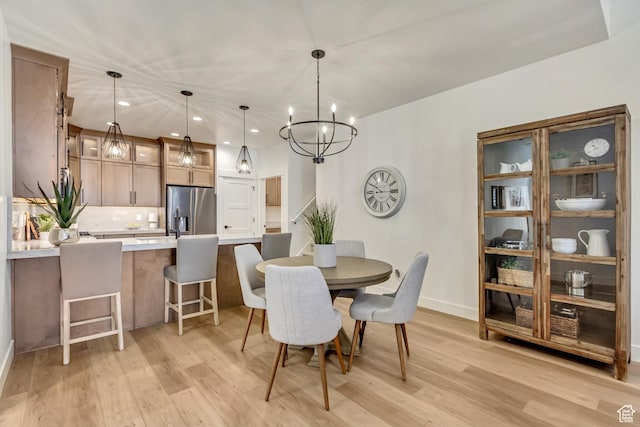 864 S 1260 W Unit 129, Heber City, UT 84032 - dining space featuring light wood-style floors, a chandelier, baseboards, and recessed lighting