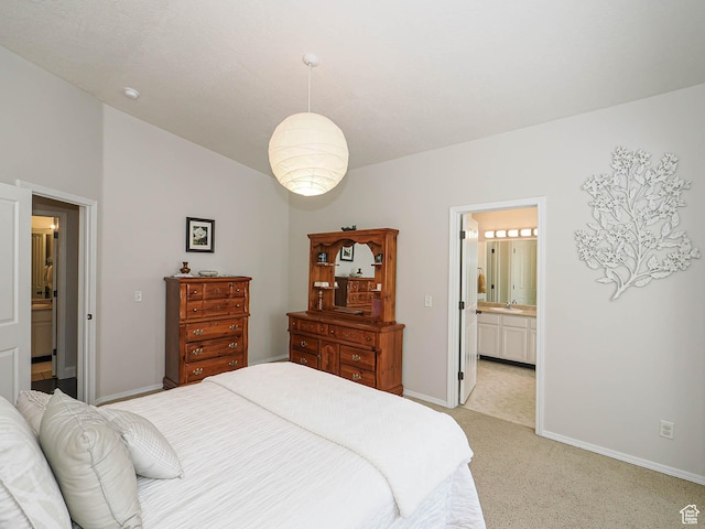 3129 S Eagle Rock Way W, West Valley City, UT 84120 - bedroom featuring baseboards, light carpet, ensuite bathroom, and lofted ceiling