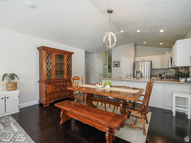 3129 S Eagle Rock Way W, West Valley City, UT 84120 - dining space with vaulted ceiling, recessed lighting, dark wood-type flooring, a chandelier, and baseboards