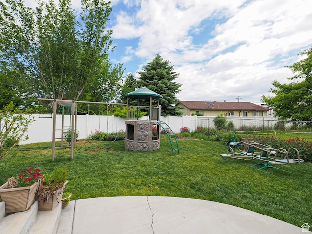 3129 S Eagle Rock Way W, West Valley City, UT 84120 - view of yard with a playground and a patio area