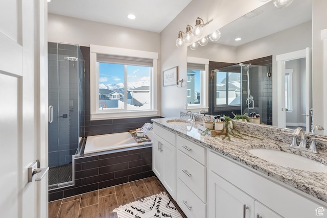 4957 N Sage Dr, Eagle Mountain, UT 84005 - bathroom with a shower stall, plenty of natural light, a bath, and recessed lighting