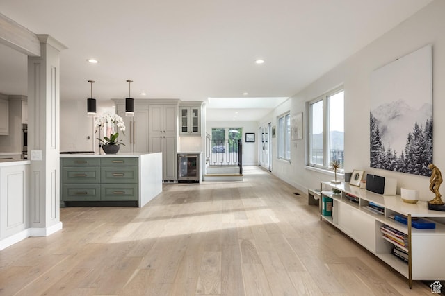 7189 N Hitching Post Dr W, Park City, UT 84098 - interior space with beverage cooler, light wood finished floors, recessed lighting, and baseboards