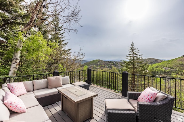 7189 N Hitching Post Dr W, Park City, UT 84098 - deck with an outdoor living space and a mountain view
