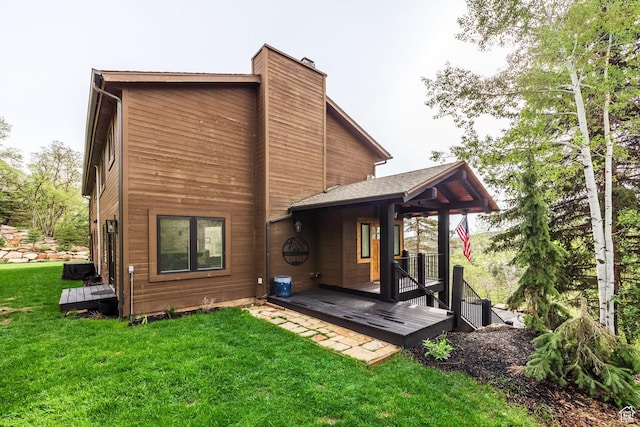 7189 N Hitching Post Dr W, Park City, UT 84098 - rear view of property with a chimney, a yard, and a deck