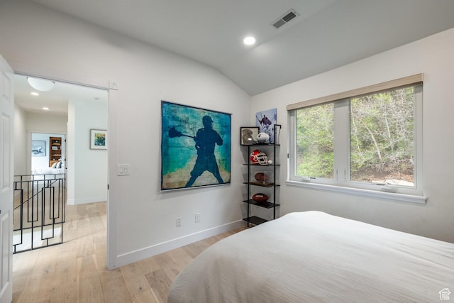7189 N Hitching Post Dr W, Park City, UT 84098 - bedroom with light wood finished floors, lofted ceiling, baseboards, and recessed lighting