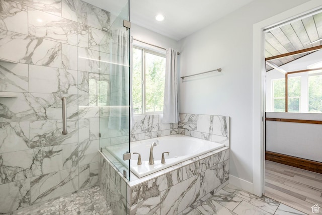 3824 N Patiosprings Dr, Eden, UT 84310 - bathroom featuring a marble finish shower, a garden tub, marble finish flooring, and baseboards