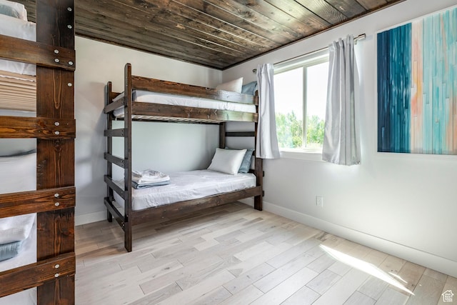 3824 N Patiosprings Dr, Eden, UT 84310 - bedroom featuring baseboards, wood finished floors, and wooden ceiling