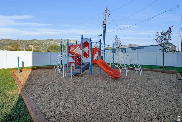 450 W Main St Unit 16, Santaquin, UT 84655 - community playground with a fenced backyard and a mountain view
