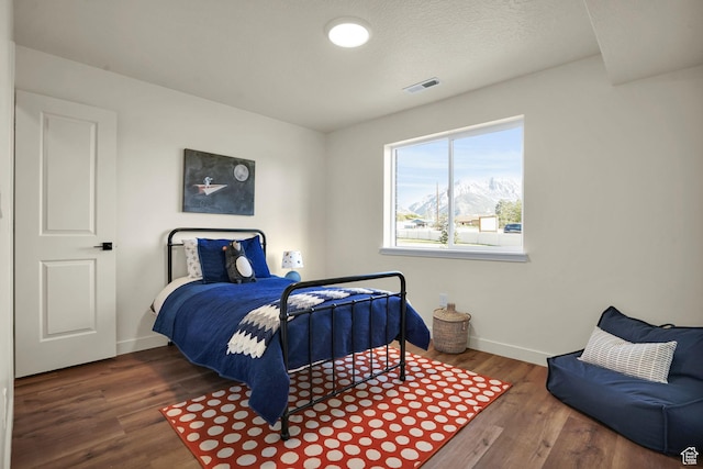 450 W Main St Unit 16, Santaquin, UT 84655 - bedroom featuring wood finished floors and baseboards