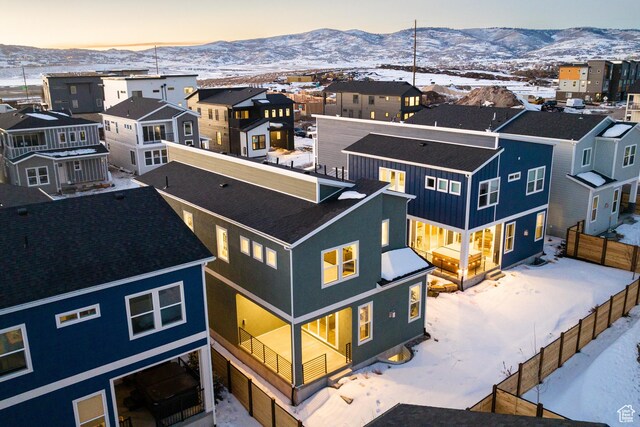 6592 Purple Poppy Ln Unit 117, Park City, UT 84098 - snowy aerial view featuring a mountain view and a residential view