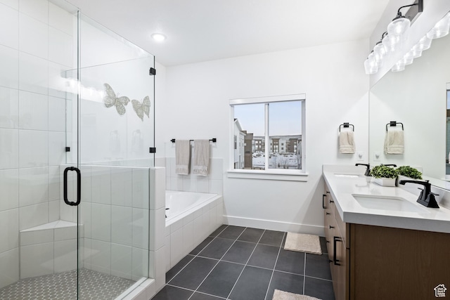 6592 Purple Poppy Ln Unit 117, Park City, UT 84098 - bathroom with tile patterned floors, a garden tub, a shower stall, baseboards, and double vanity