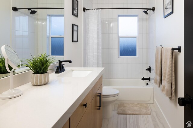 6592 Purple Poppy Ln Unit 117, Park City, UT 84098 - full bathroom featuring shower / tub combo with curtain, toilet, vanity, and baseboards