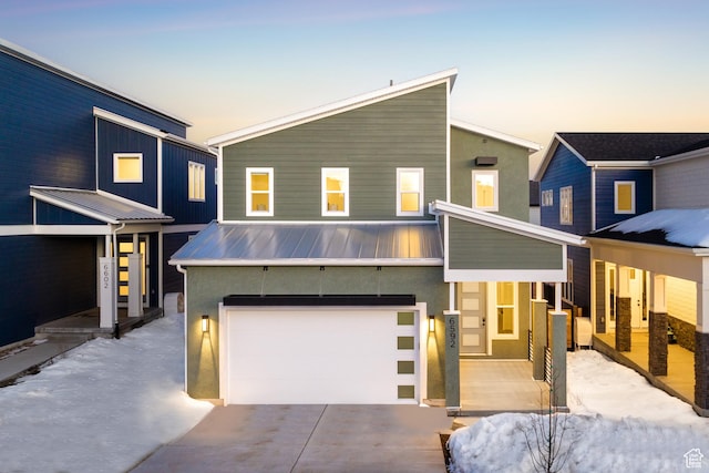 6592 Purple Poppy Ln Unit 117, Park City, UT 84098 - contemporary house featuring a garage, driveway, a standing seam roof, and stucco siding