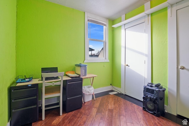1632 W Whitlock Ave, West Valley City, UT 84119 - office with dark wood finished floors, a textured wall, and baseboards
