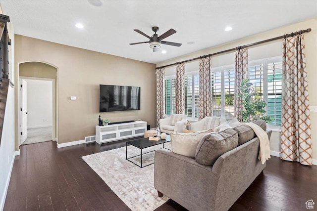 10451 S Abbott Way S, Jordan, UT 84009 - living area featuring baseboards, ceiling fan, dark wood-type flooring, arched walkways, and recessed lighting