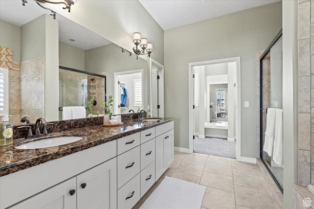 10451 S Abbott Way S, Jordan, UT 84009 - full bath with a stall shower, double vanity, tile patterned flooring, and baseboards