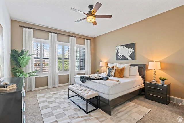 10451 S Abbott Way S, Jordan, UT 84009 - bedroom featuring light carpet, baseboards, and ceiling fan