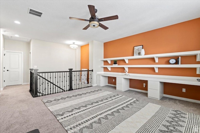 10451 S Abbott Way S, Jordan, UT 84009 - unfurnished office with carpet floors, a ceiling fan, baseboards, and built in desk
