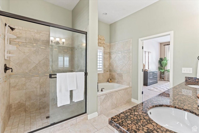 10451 S Abbott Way S, Jordan, UT 84009 - bathroom with a garden tub, a stall shower, vanity, and tile patterned floors