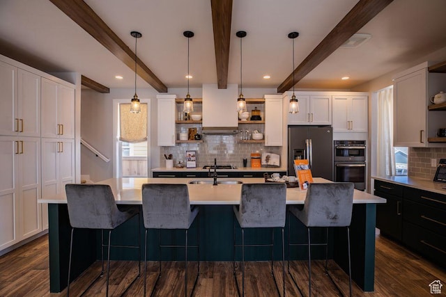 0, St. George, UT 84790 - kitchen featuring open shelves, refrigerator with ice dispenser, multiple ovens, white cabinets, and beam ceiling