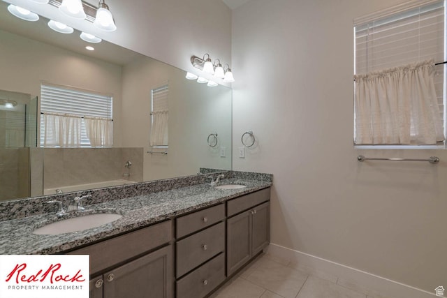 0, St. George, UT 84790 - bathroom with tile patterned flooring, baseboards, a bath, and double vanity