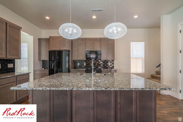 0, St. George, UT 84790 - kitchen with black appliances, a chandelier, a sink, backsplash, and recessed lighting